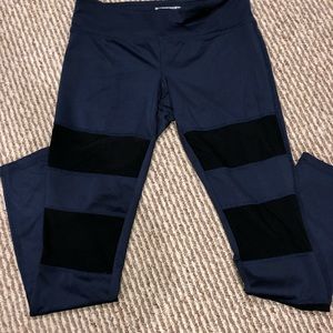 Blue leggings with black panel mesh